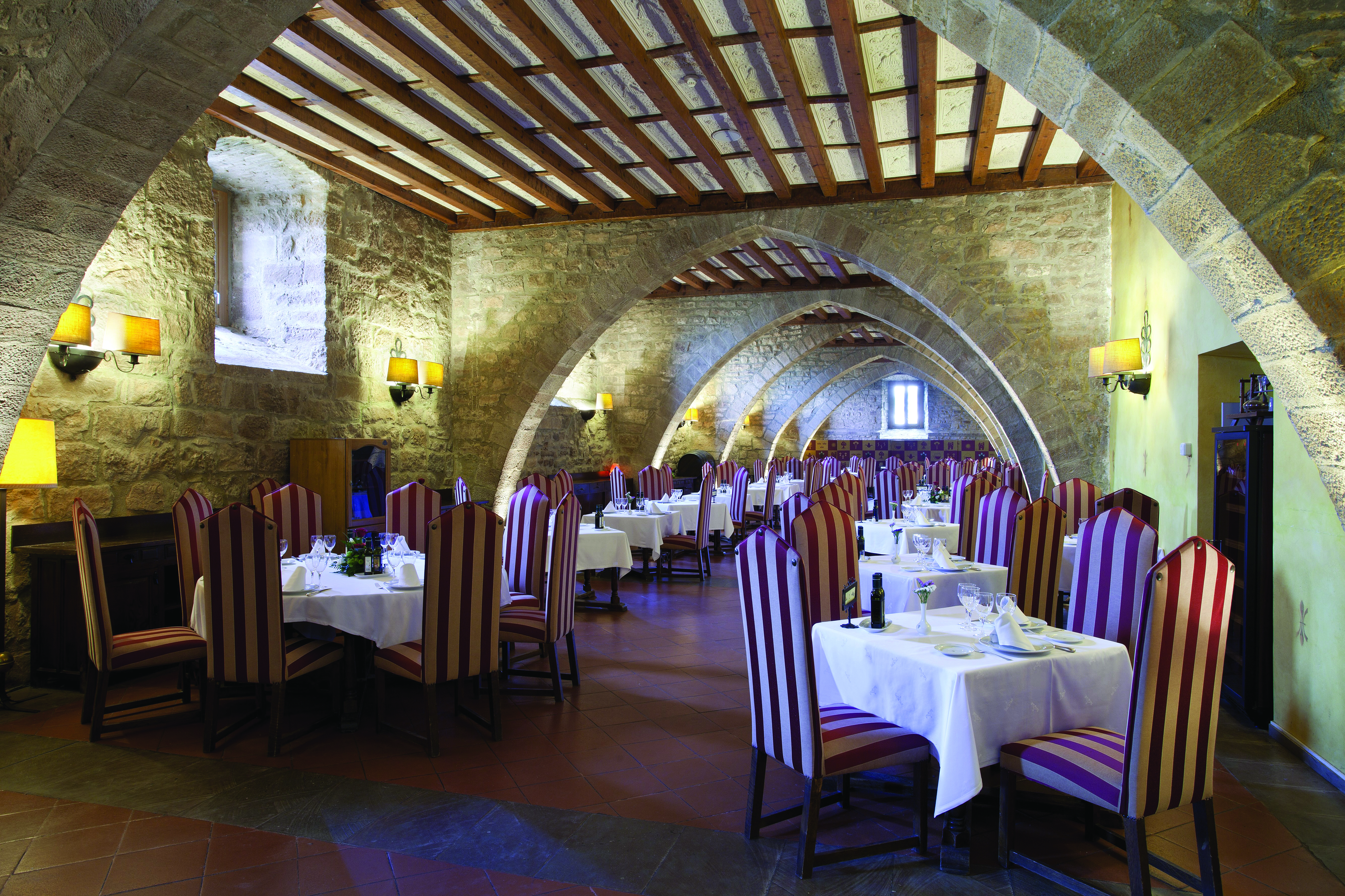 Parador de Cardona Catalonia restaurant indoor dining area medieval architecture