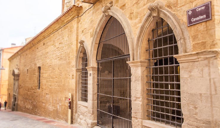 Parador de Lleida exterior, traditional architecture, old brick wall, metal gates
