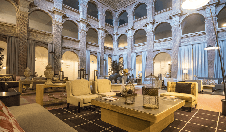 Parador de Lleida lobby lounge, tables, chairs, sofas, traditional architecture, tiled floors