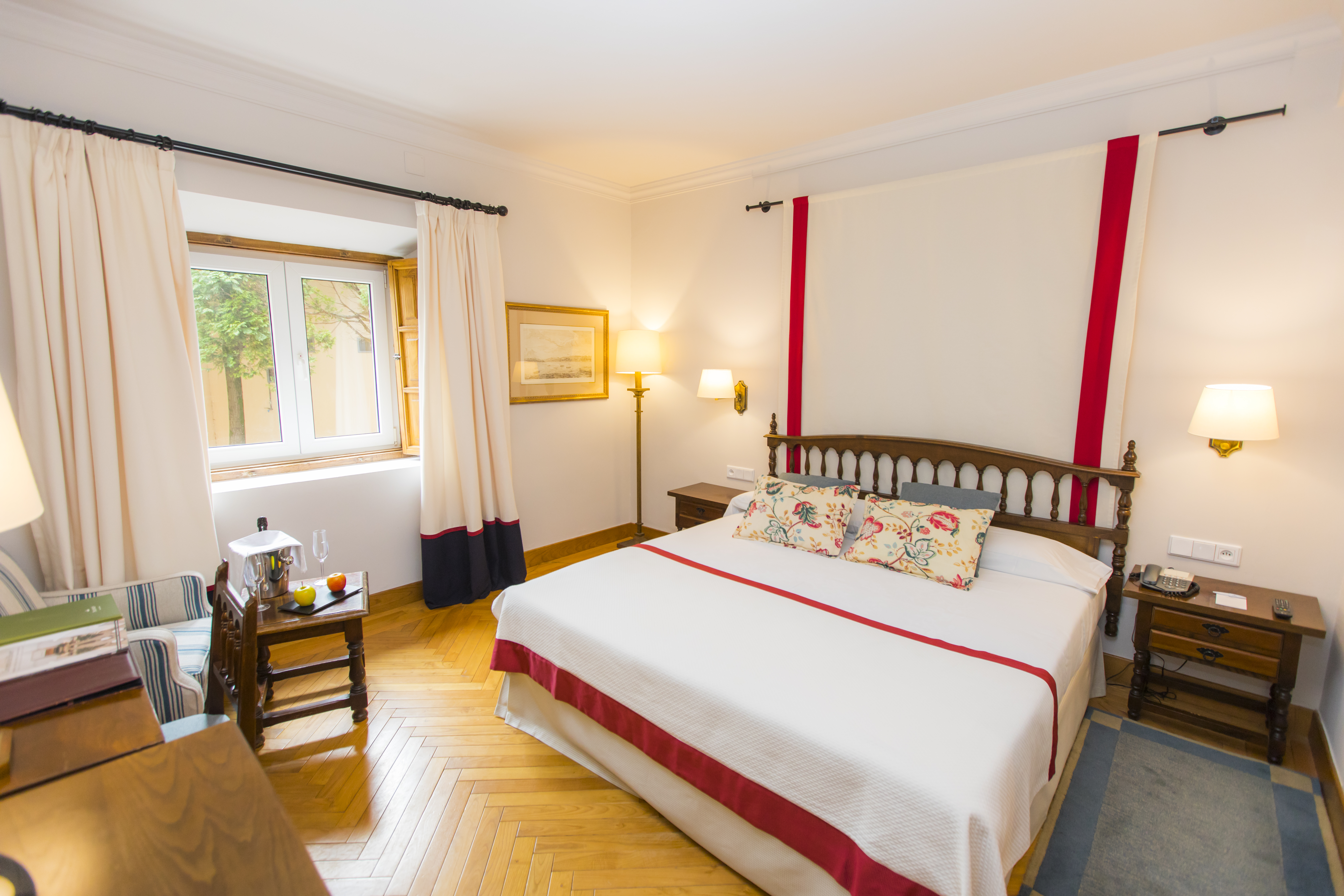 Parador de Ribadeo standard room, double bed, wooden floor, traditional decor