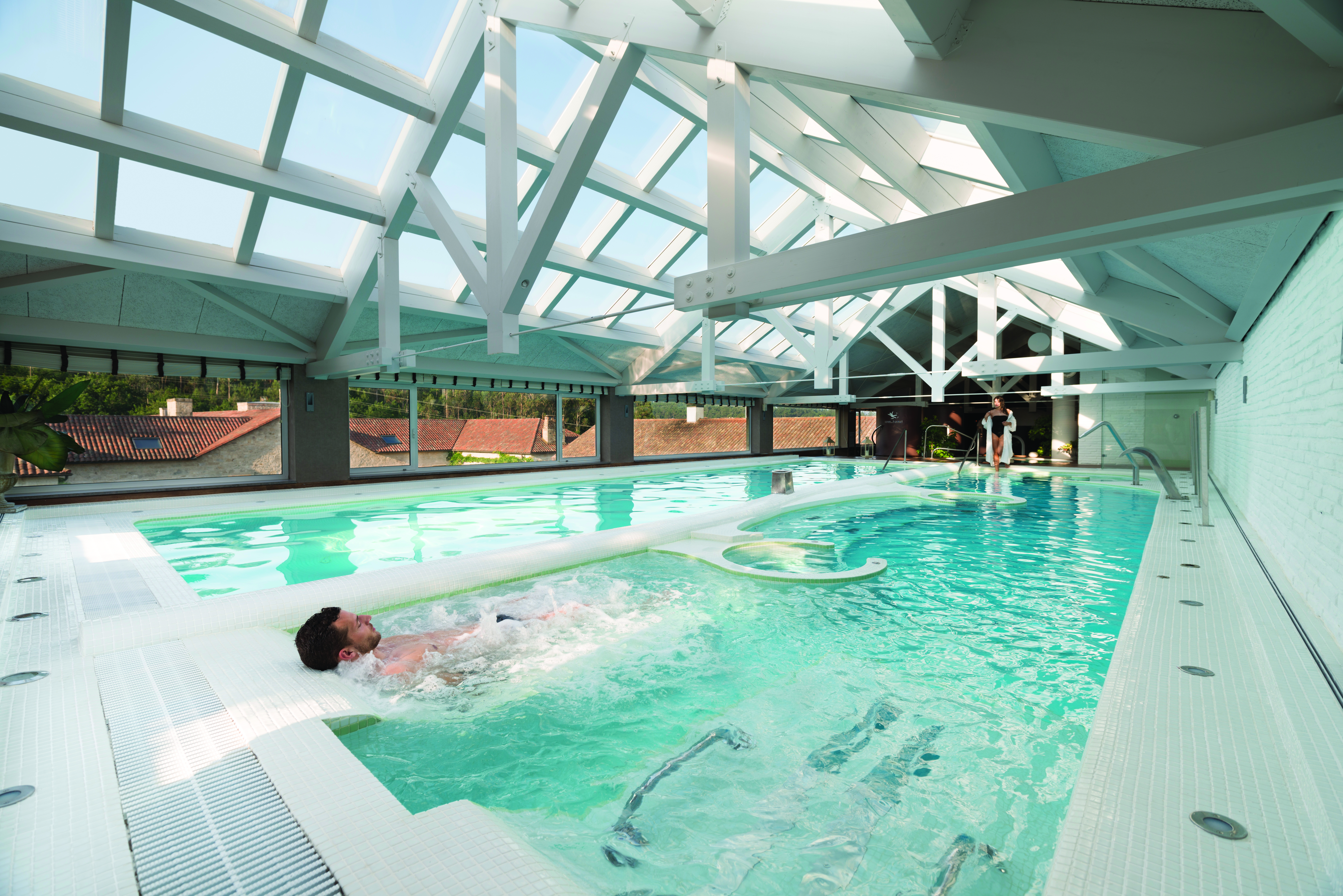 A Quinta Da Auga Galicia spa indoor pool man in pool