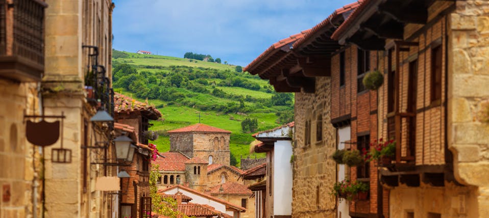 Golden stone houses of village scene in Santillana de Mar in Cantabria