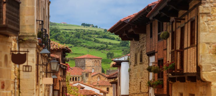 Golden stone houses of village scene in Santillana de Mar in Cantabria
