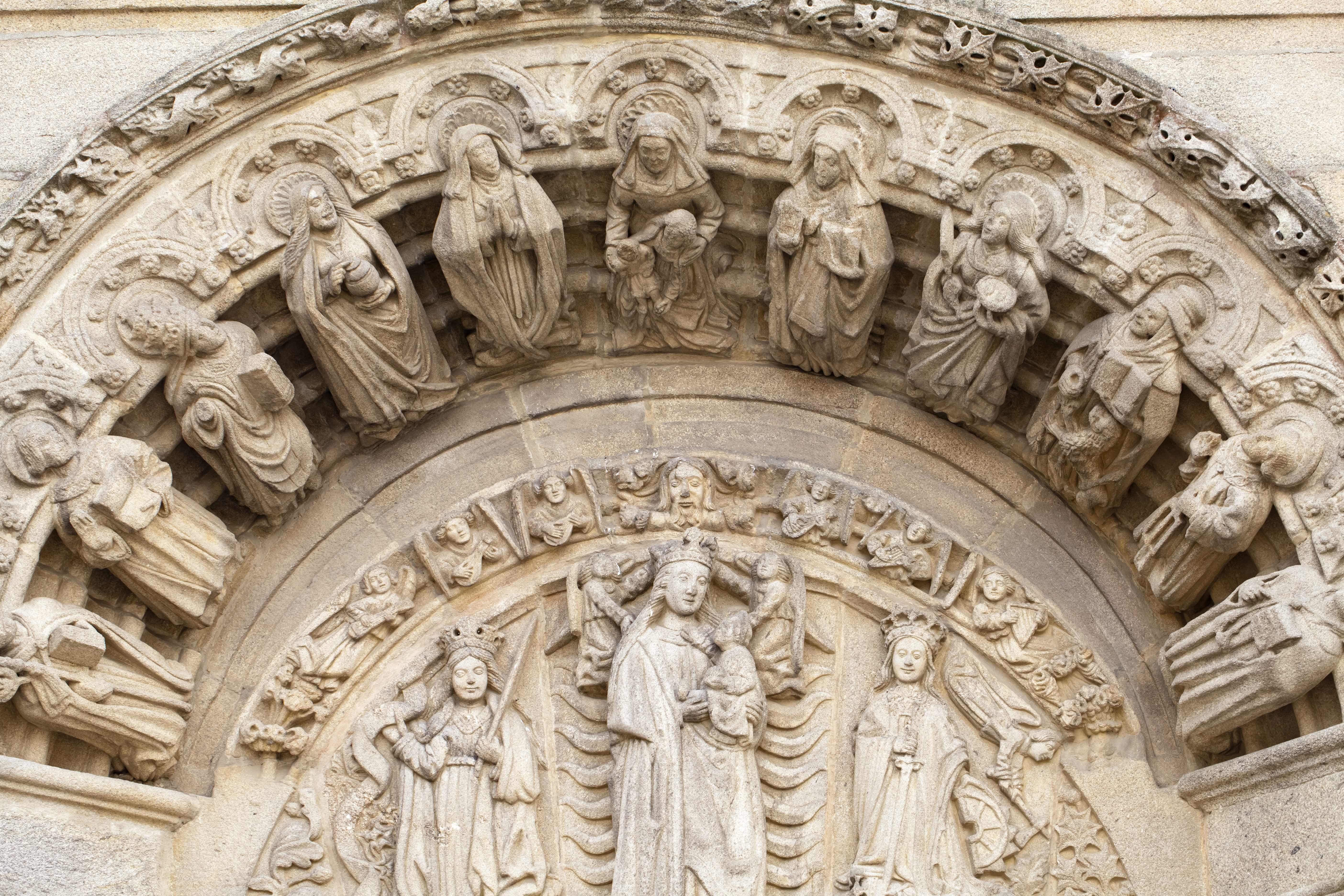 Stone carvings on the outside of a building in Obradoiro square in Santiago de Compostela