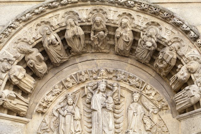 Stone carvings on the outside of a building in Obradoiro square in Santiago de Compostela