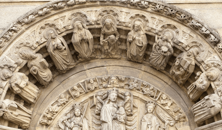Stone carvings on the outside of a building in Obradoiro square in Santiago de Compostela