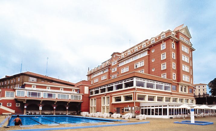 Hesperia Finisterre Green Spain pool hotel in background