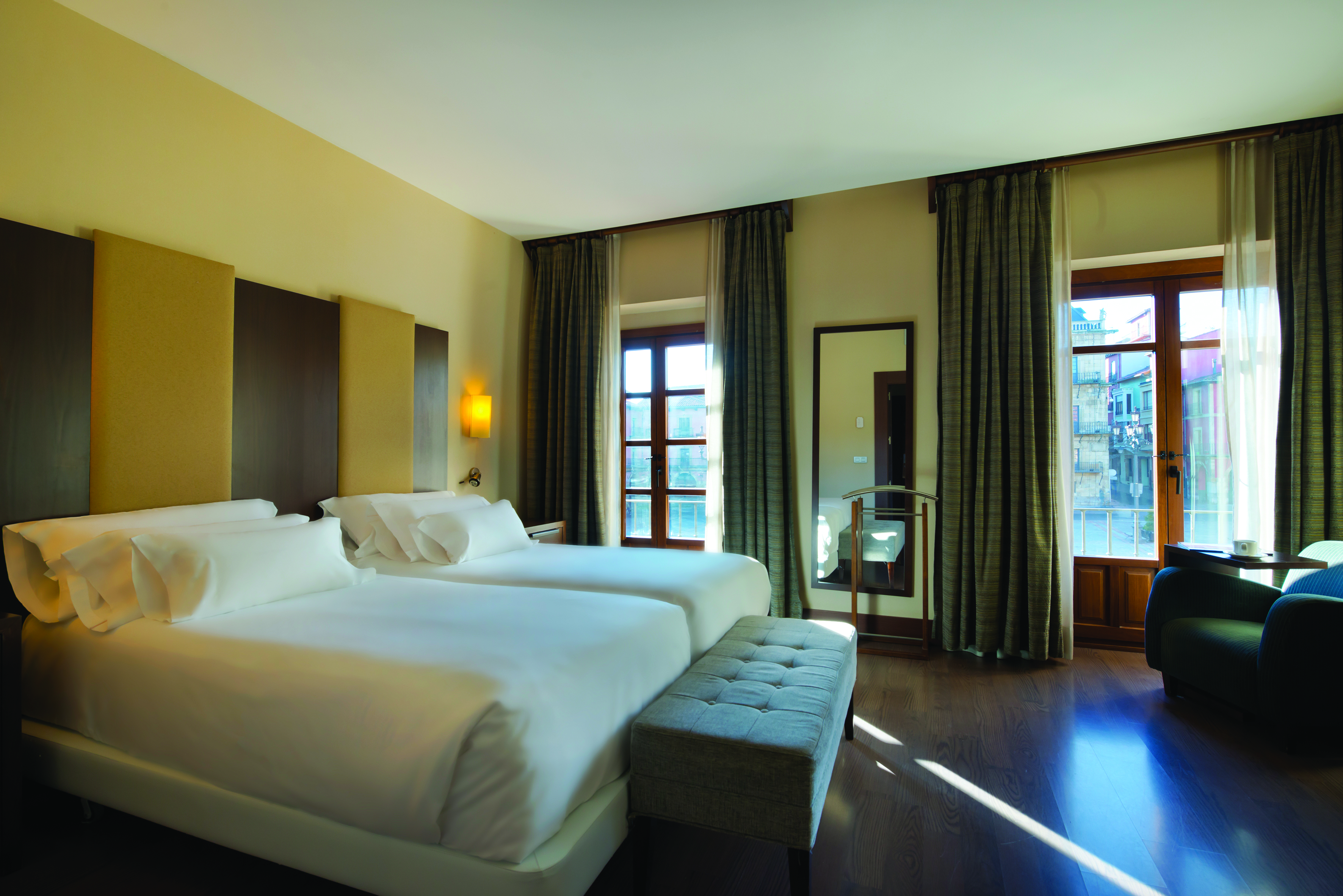 NH Collection Leon Plaza Mayor Green Spain superior room bed modern décor