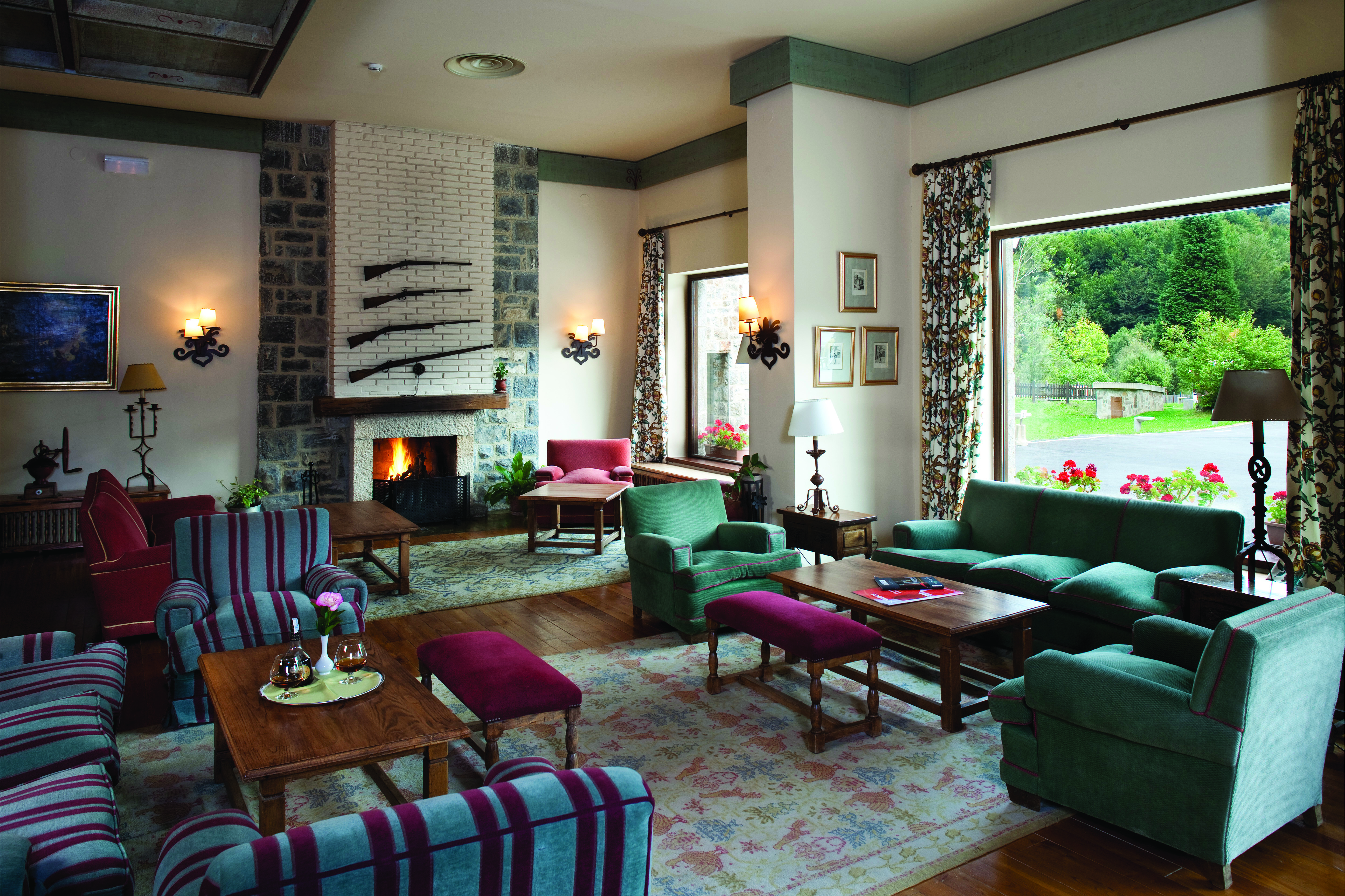 Parador de Fuente De Green Spain lounge indoor communal sitting area cosy décor open fire