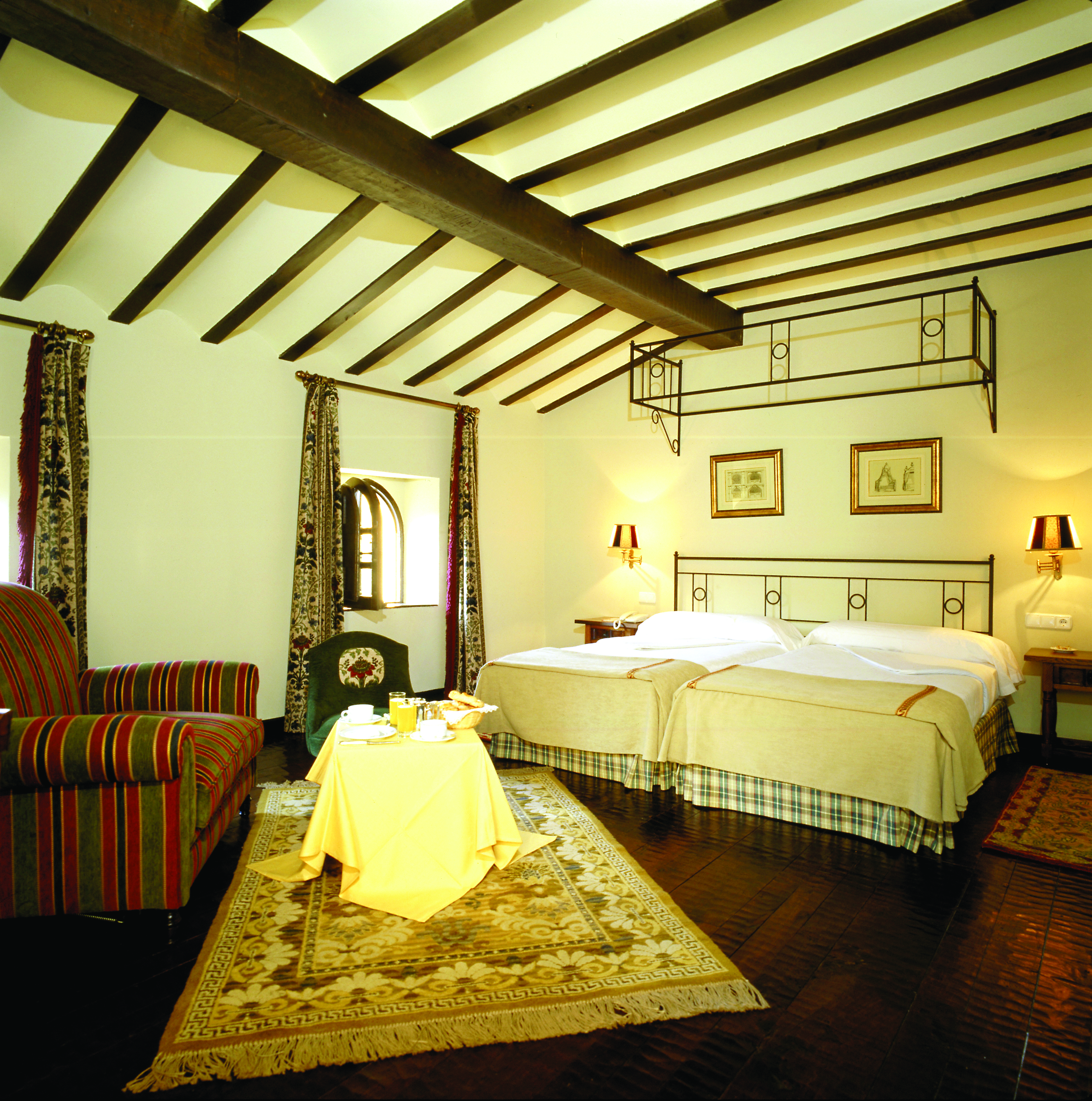 Parador de Santillana Gil Blas Green Spain bedroom sofa traditional décor