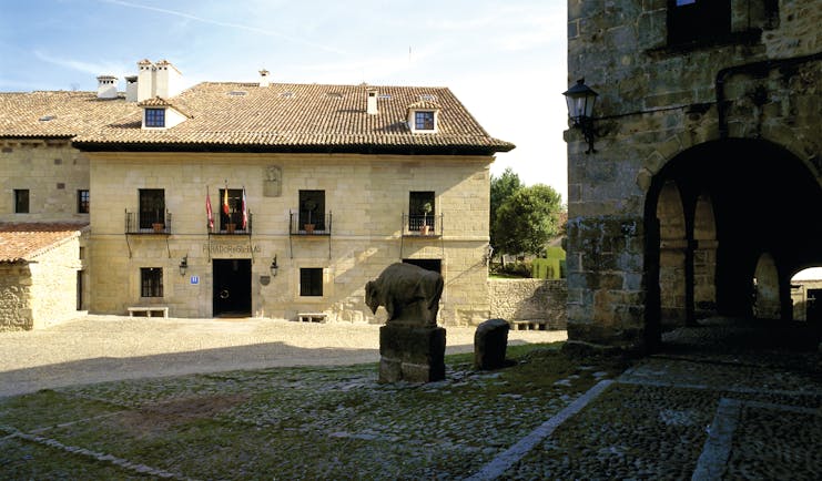 Parador de Santillana Gil Blas Green Spain exterior stone building patio