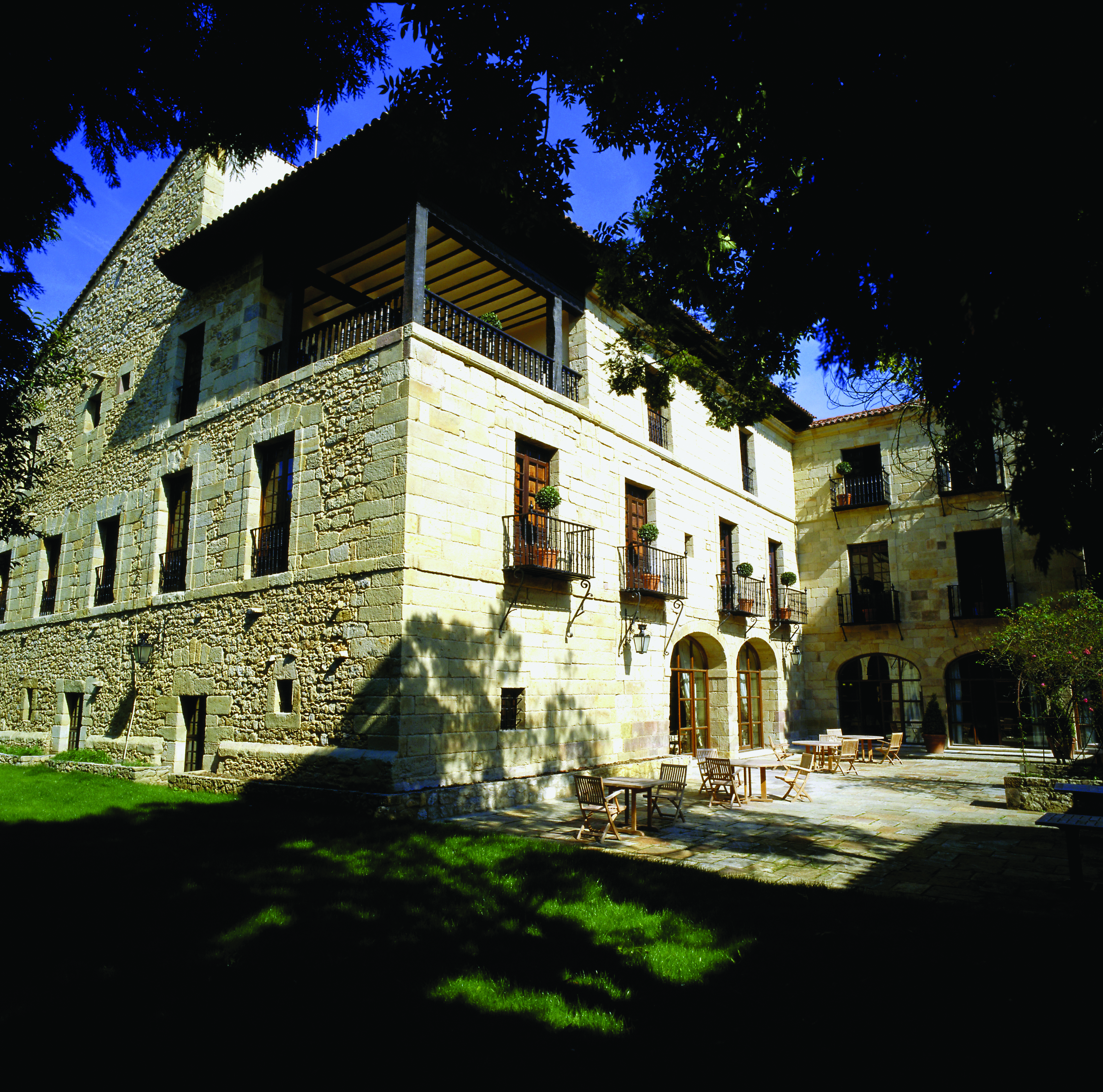 Parador de Santillana Gil Blas Green Spain patio outdoor seating area