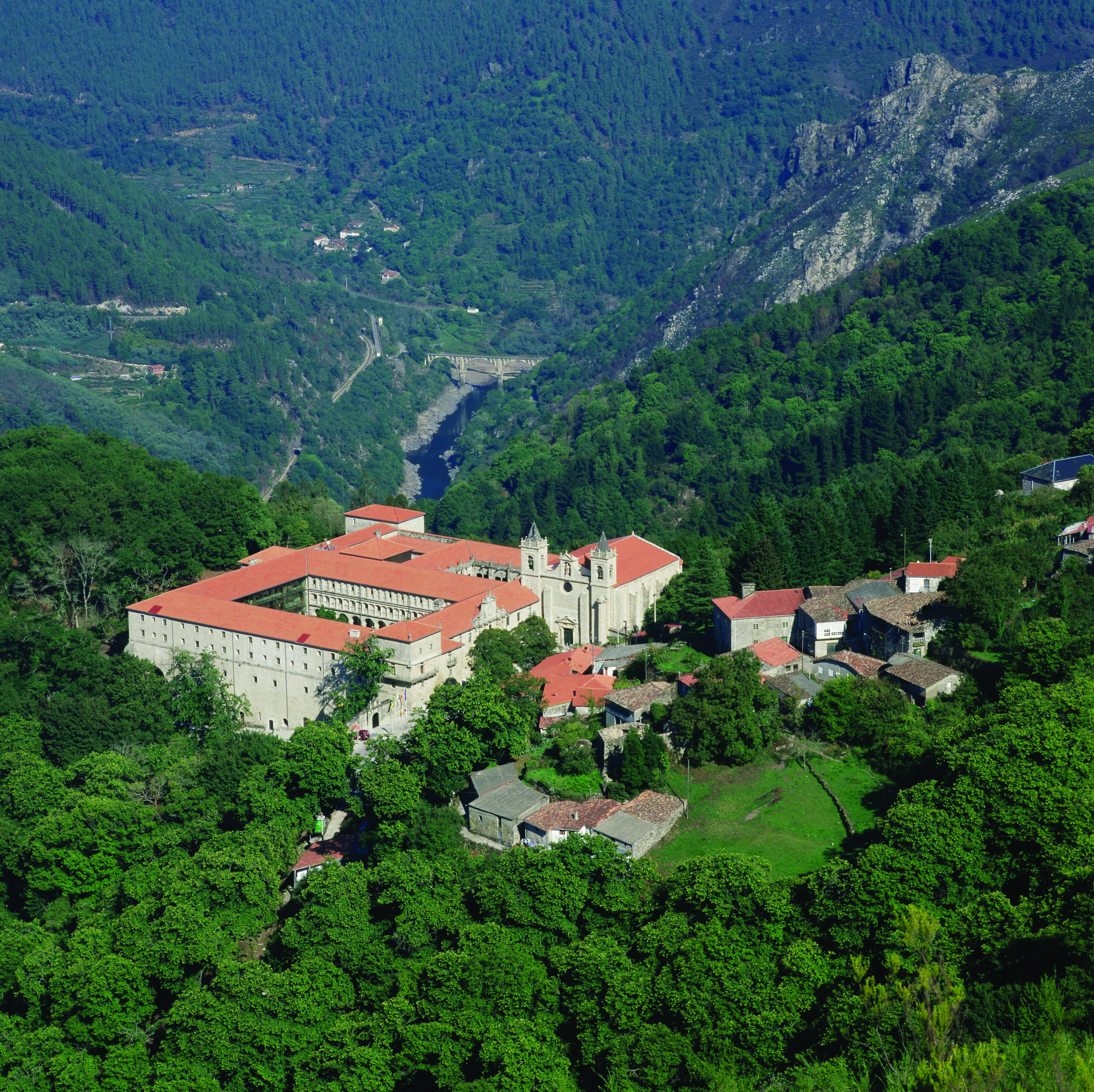 Parador de Santo Estevo Green Spain aerial shot of hotel in the mountains