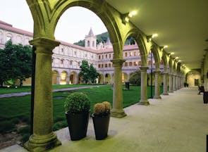 Parador de Santo Estevo Green Spain courtyard colonnaded walkways lawn
