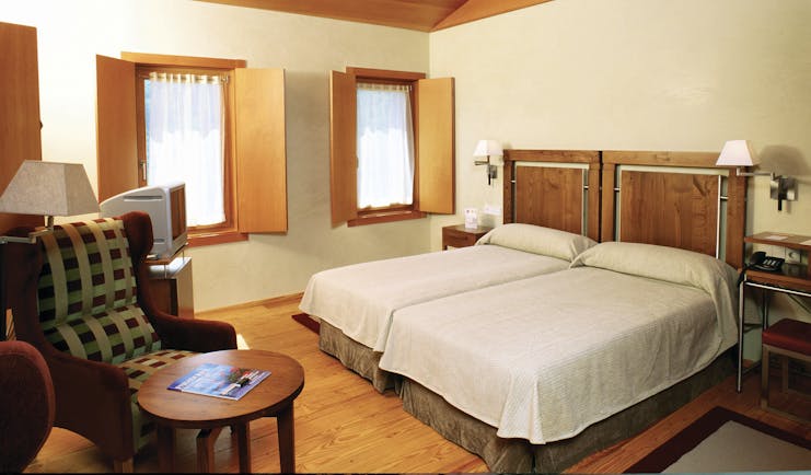 Parador de Santo Estevo Green Spain twin room beds armchair modern décor