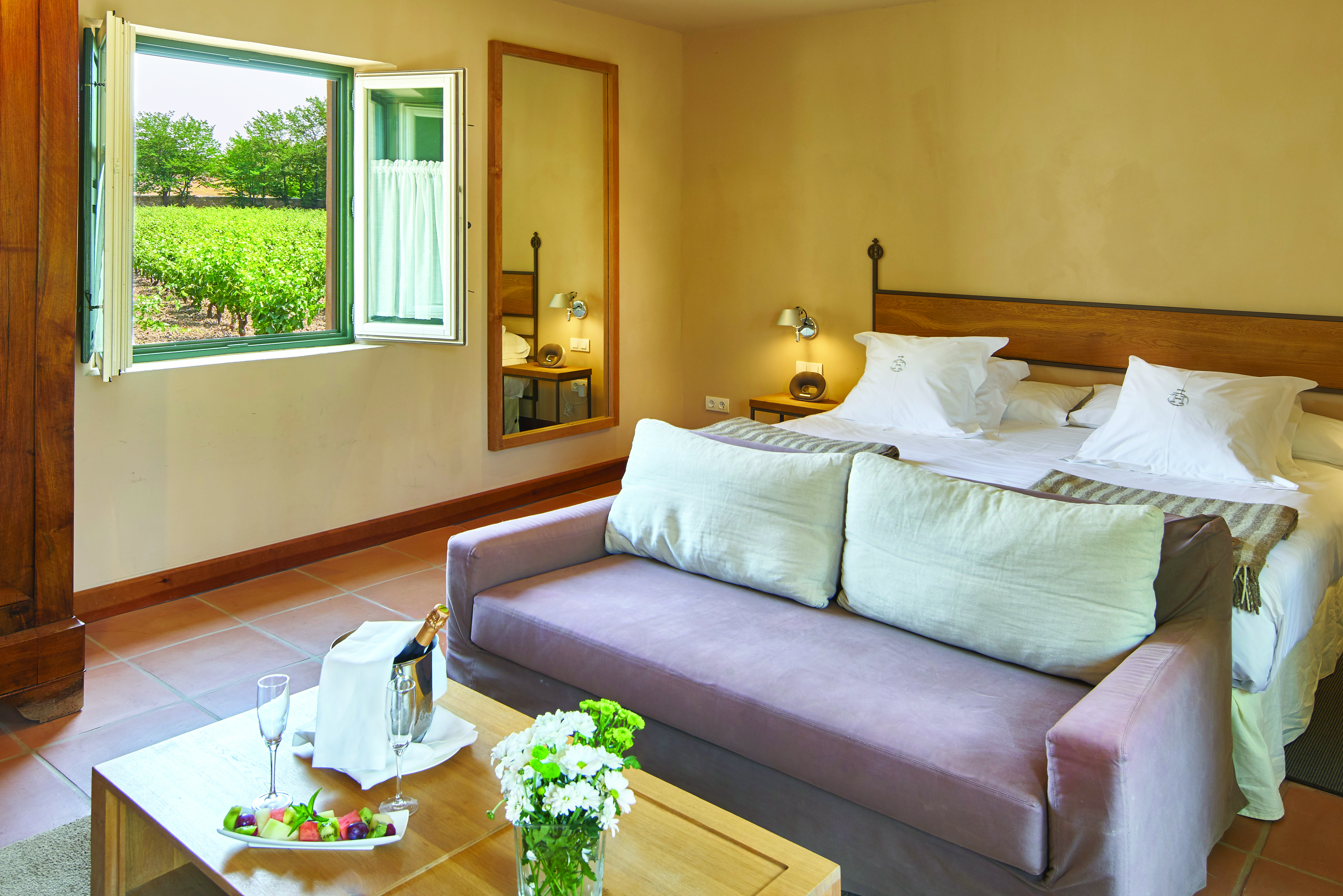 Hacienda Zorita Heart of Spain villa bedroom bed sofa elegant décor