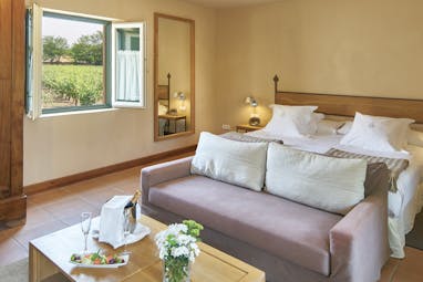 Hacienda Zorita Heart of Spain villa bedroom bed sofa elegant décor