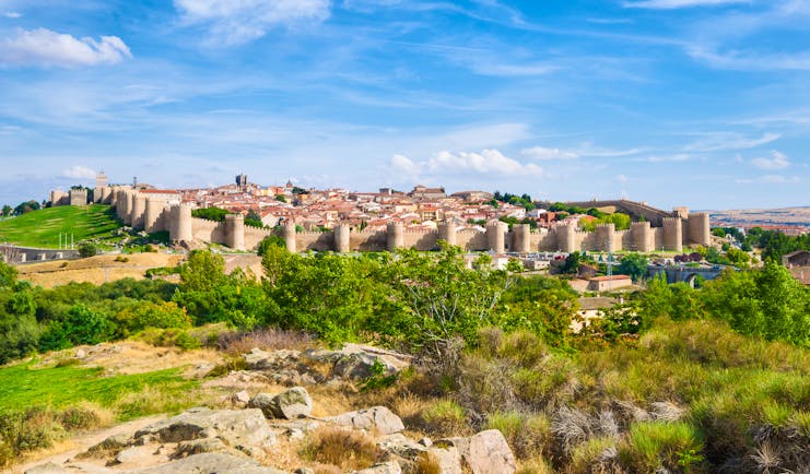 Perfect medieaval walls with turrets of the city of Avila