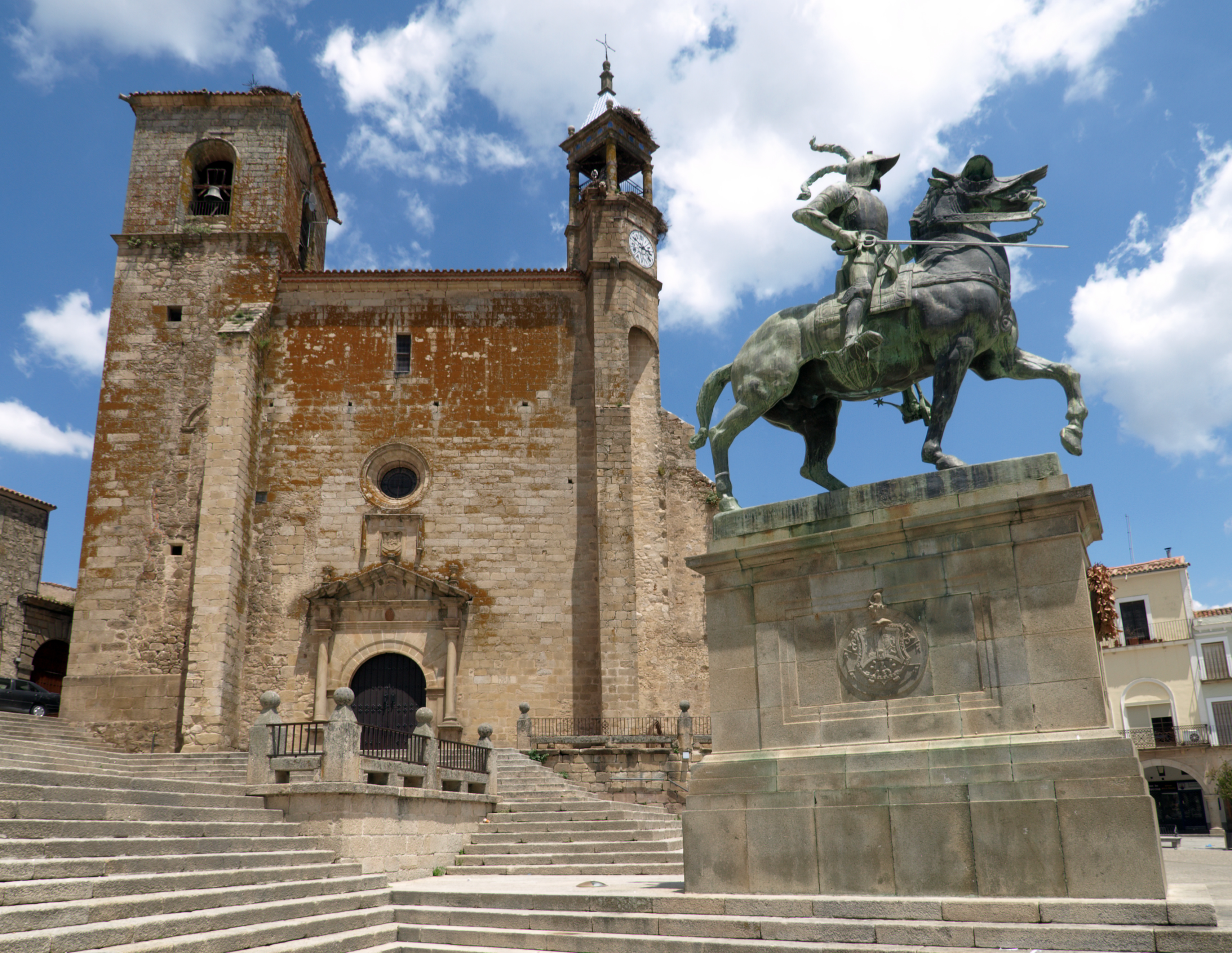 Statue of Francsico Pizarro on horseback outside the medieval stone church of St Martin in Trujillo