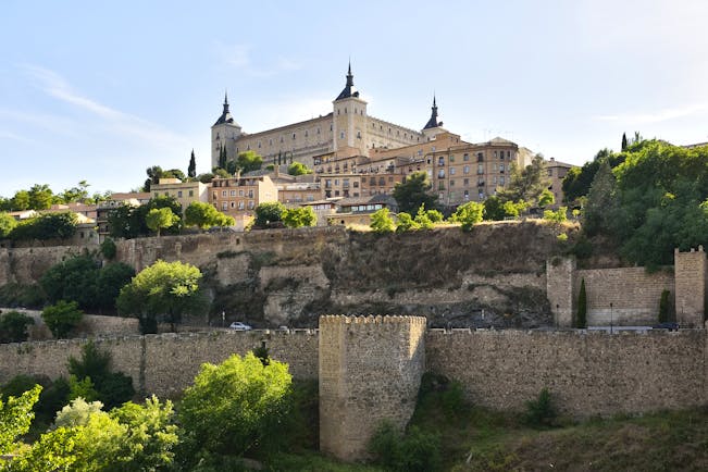 The square shaped Alcazar of Toledo on hill top above city fortifications