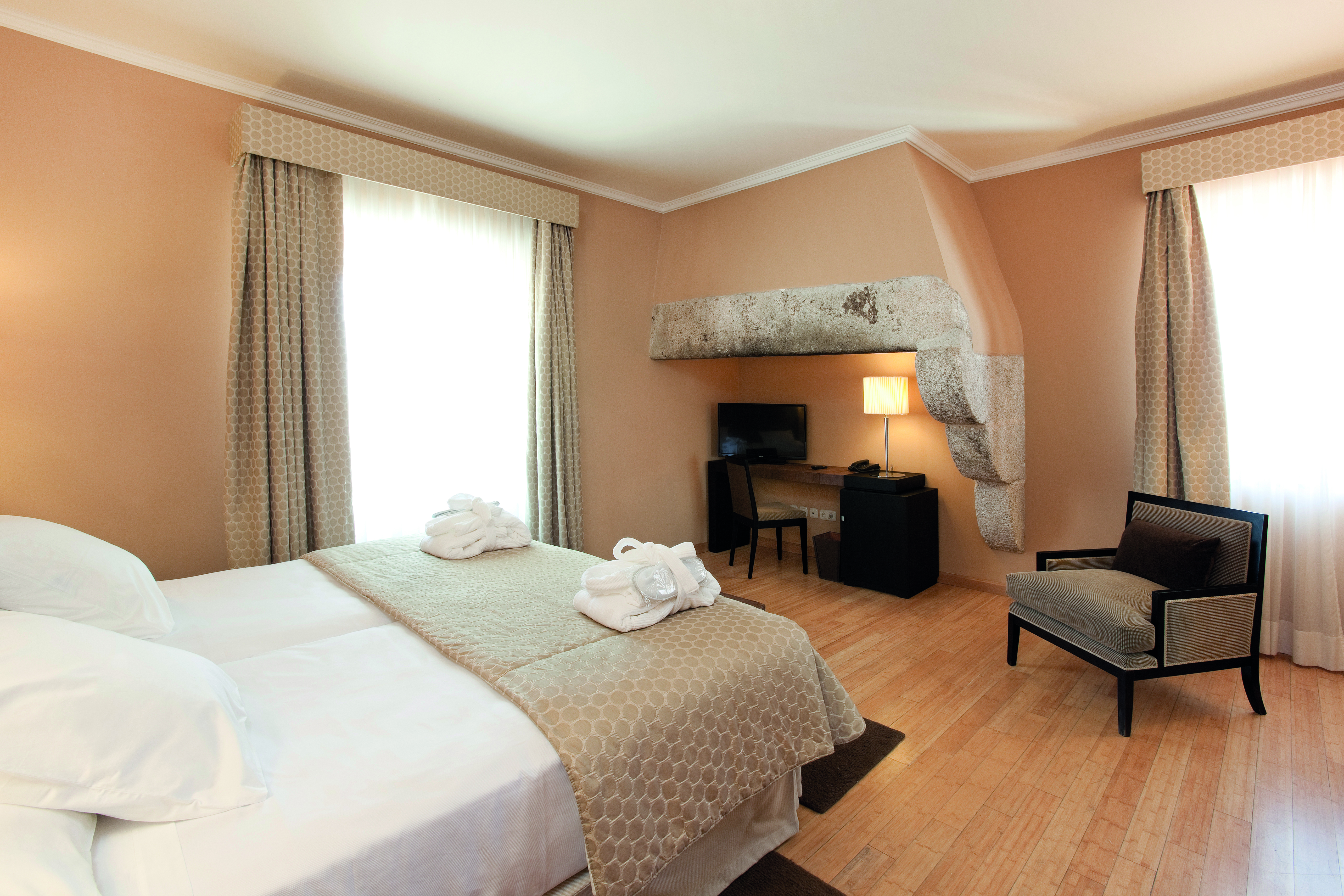 Hospes Palacio de Arenales Heart of Spain junior suite bed chair desk modern décor