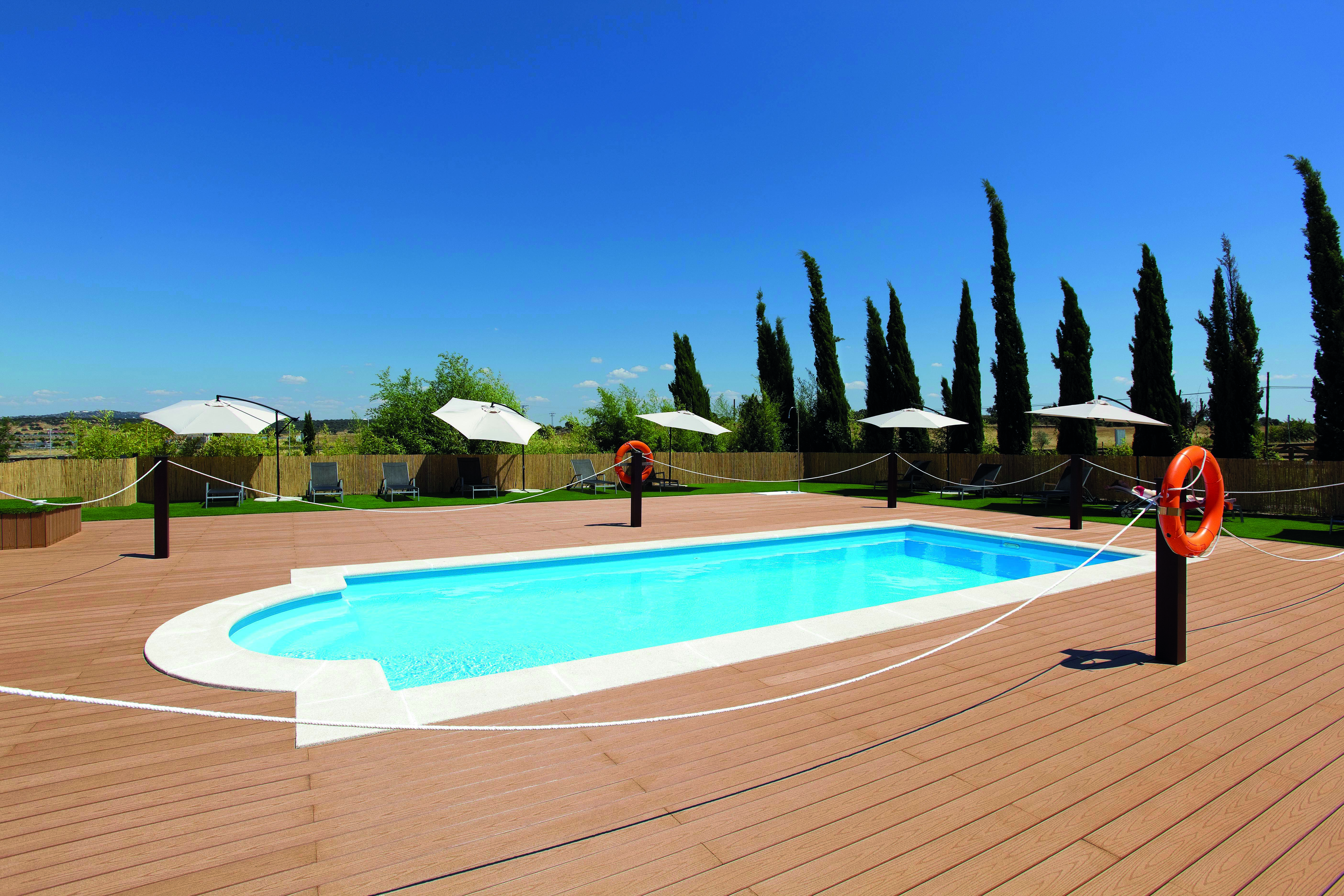 Hospes Palacio de Arenales Heart of Spain pool terrace lawns sun loungers umbrellas