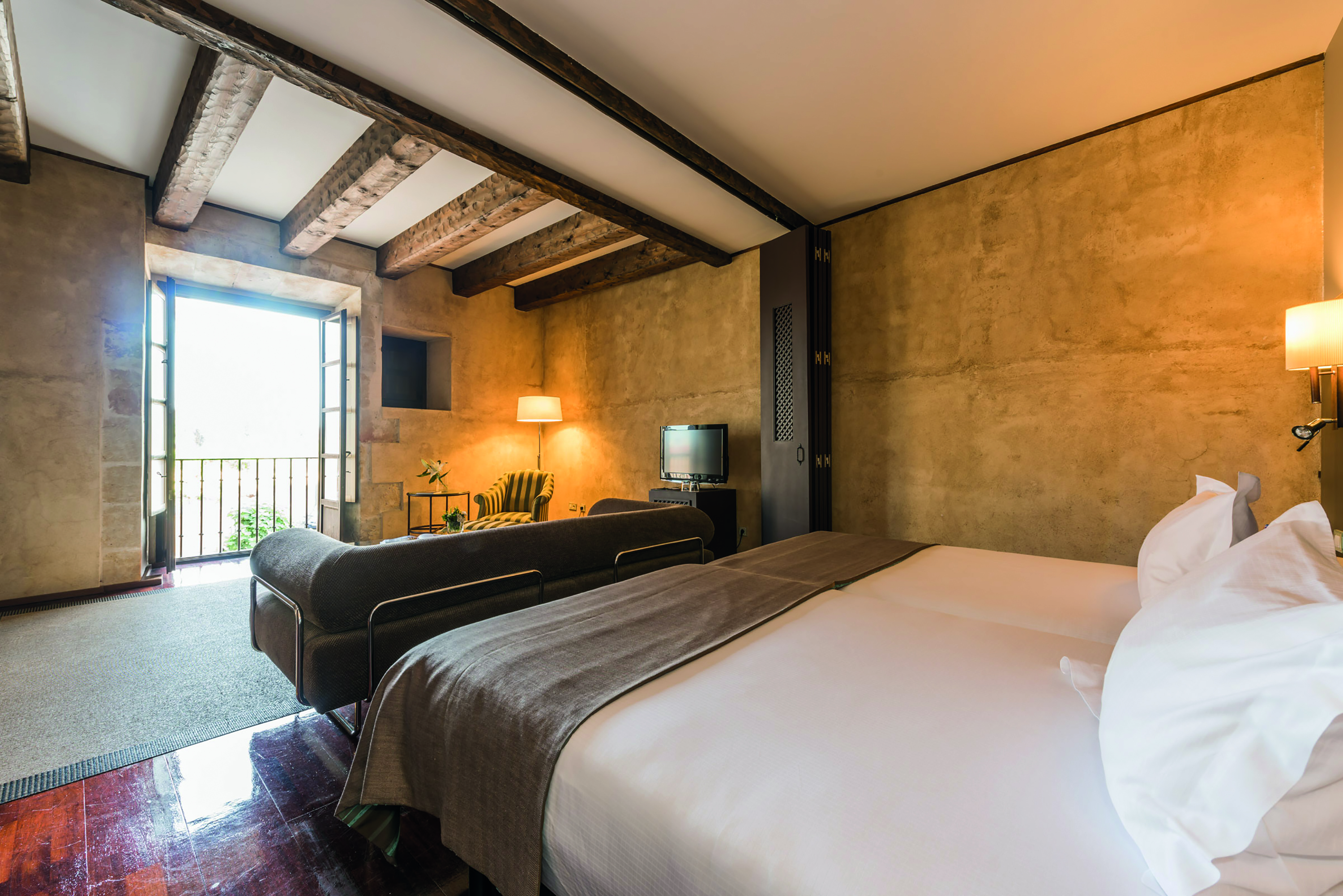 Hospes Palacio de San Esteban Heart of Spain suite lounge area modern décor