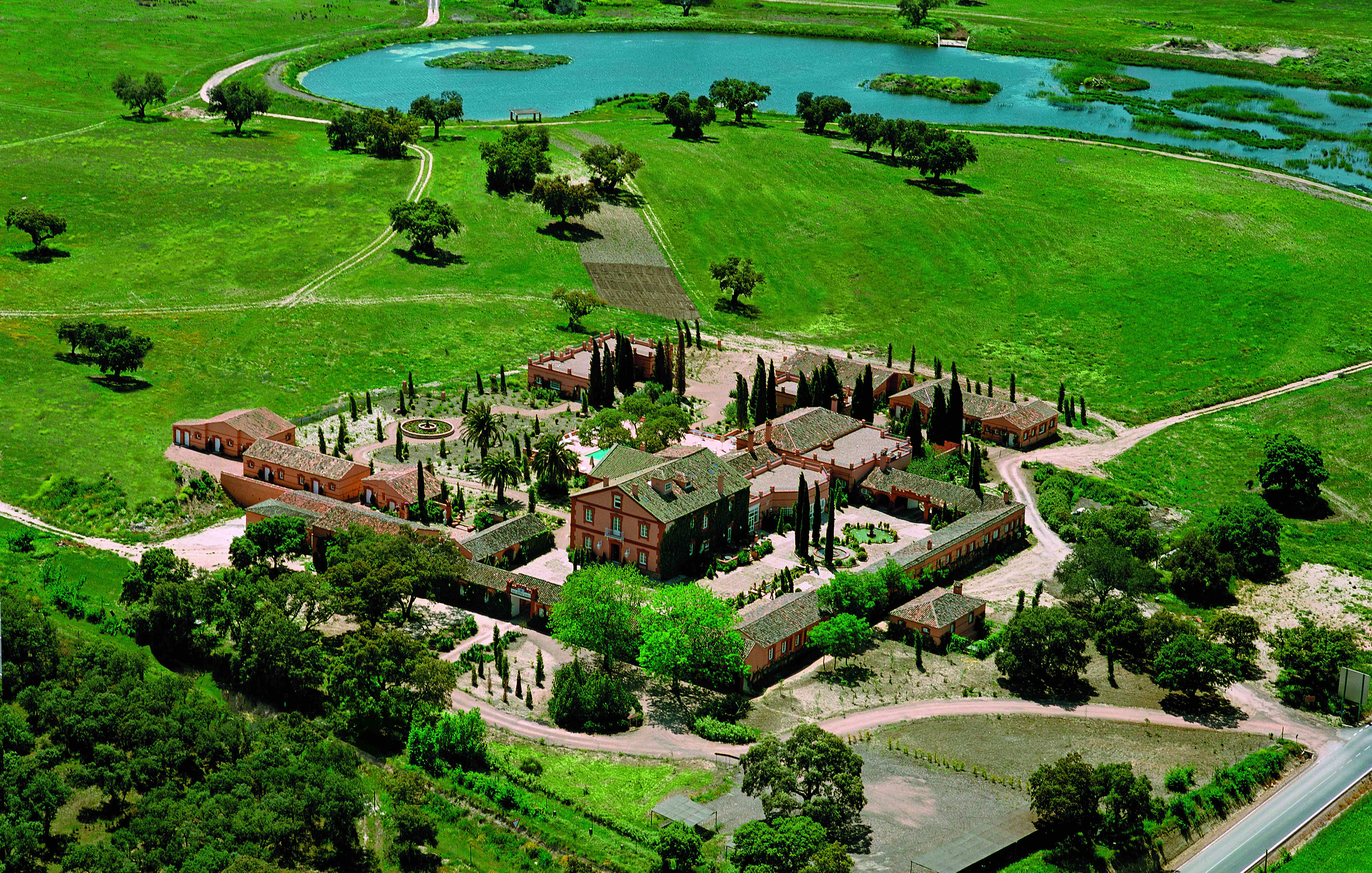 Hotel Valdepalacios Heart of Spain superior room bed living area waiter elegant décor