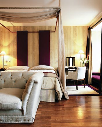 Palacio de la Merced Heart of Spain guestroom modern décor bed sofa