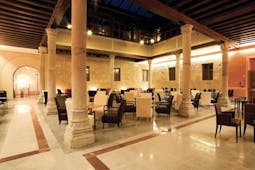 Palacio San Facundo Heart of Spain atrium indoor seating area marble floors columns modern décor