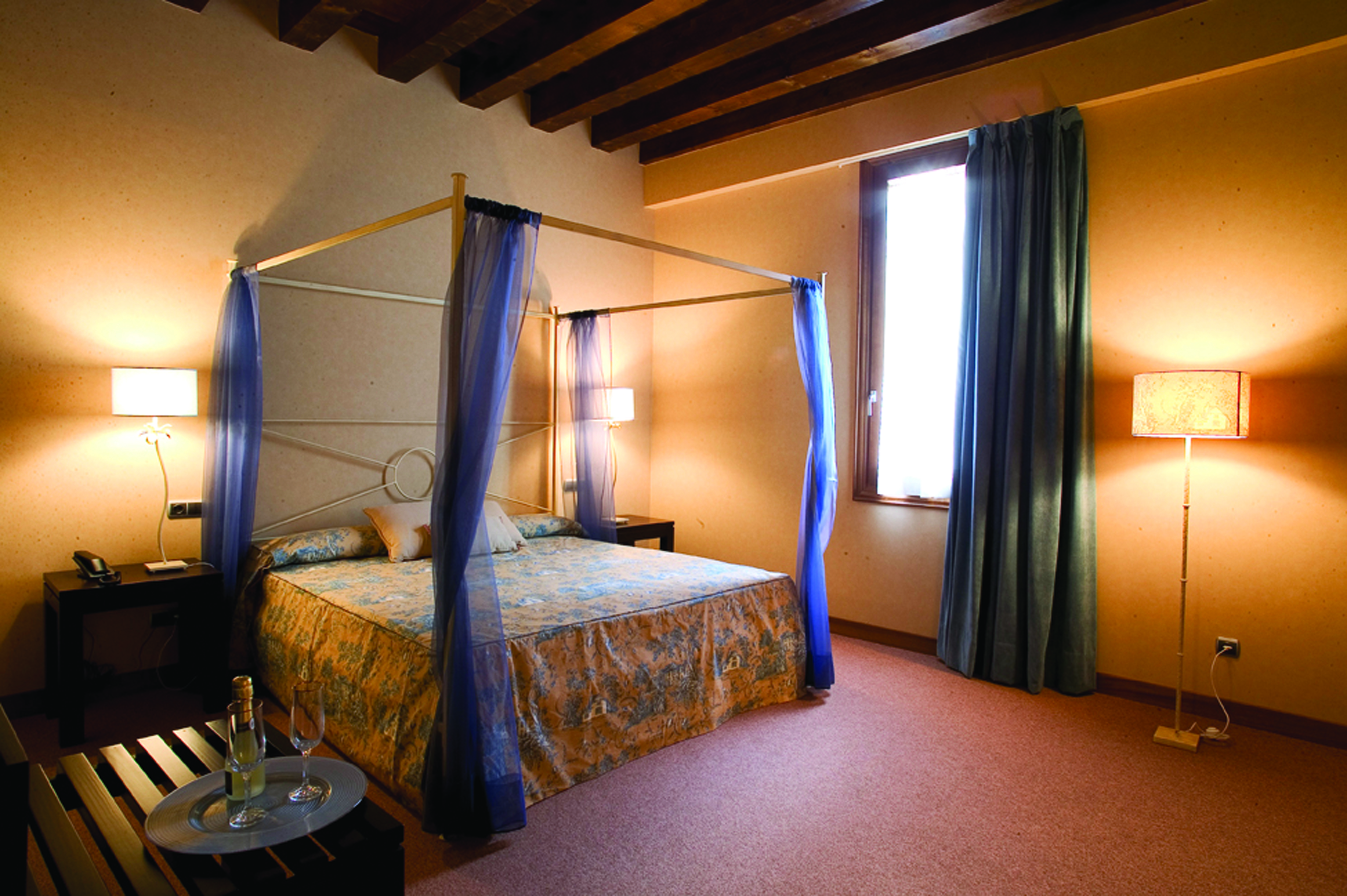 Palacio San Facundo Heart of Spain superior double guest room canopied bed modern decor