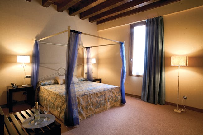Palacio San Facundo Heart of Spain superior double guest room canopied bed modern decor