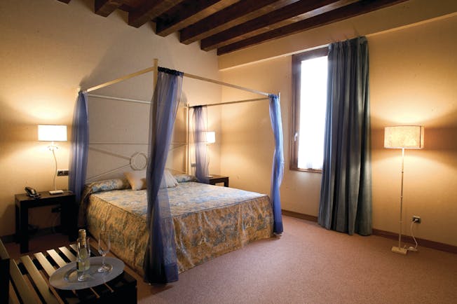 Palacio San Facundo Heart of Spain superior double guest room canopied bed modern decor