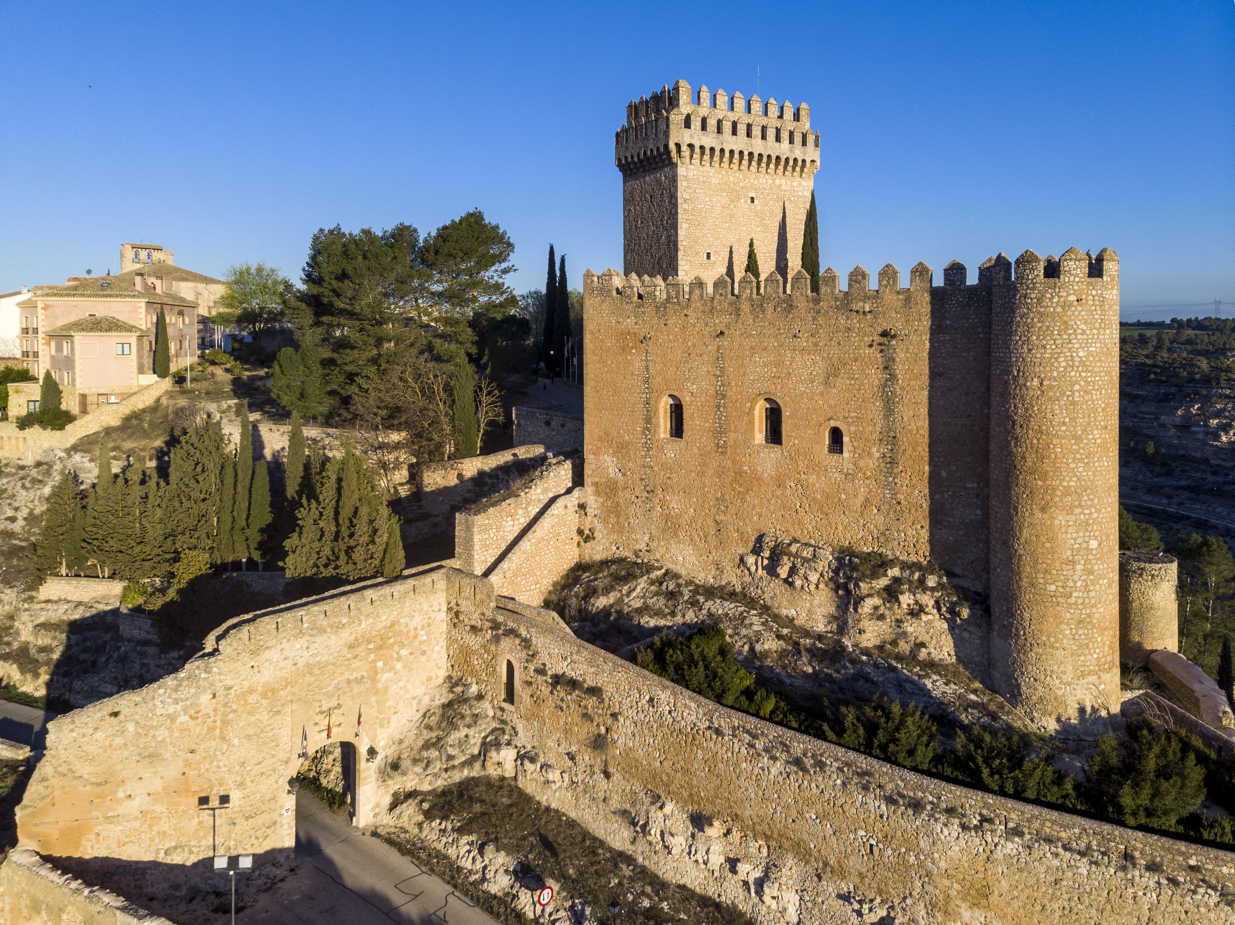 Parador de Alarcon yellow stone fortified castle with tower