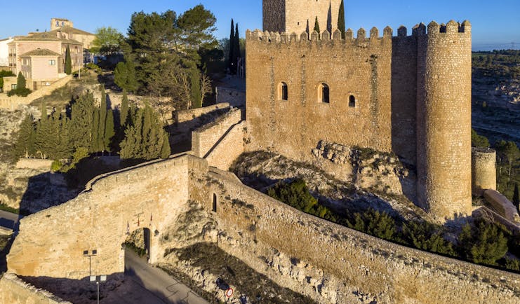 Parador de Alarcon yellow stone fortified castle with tower