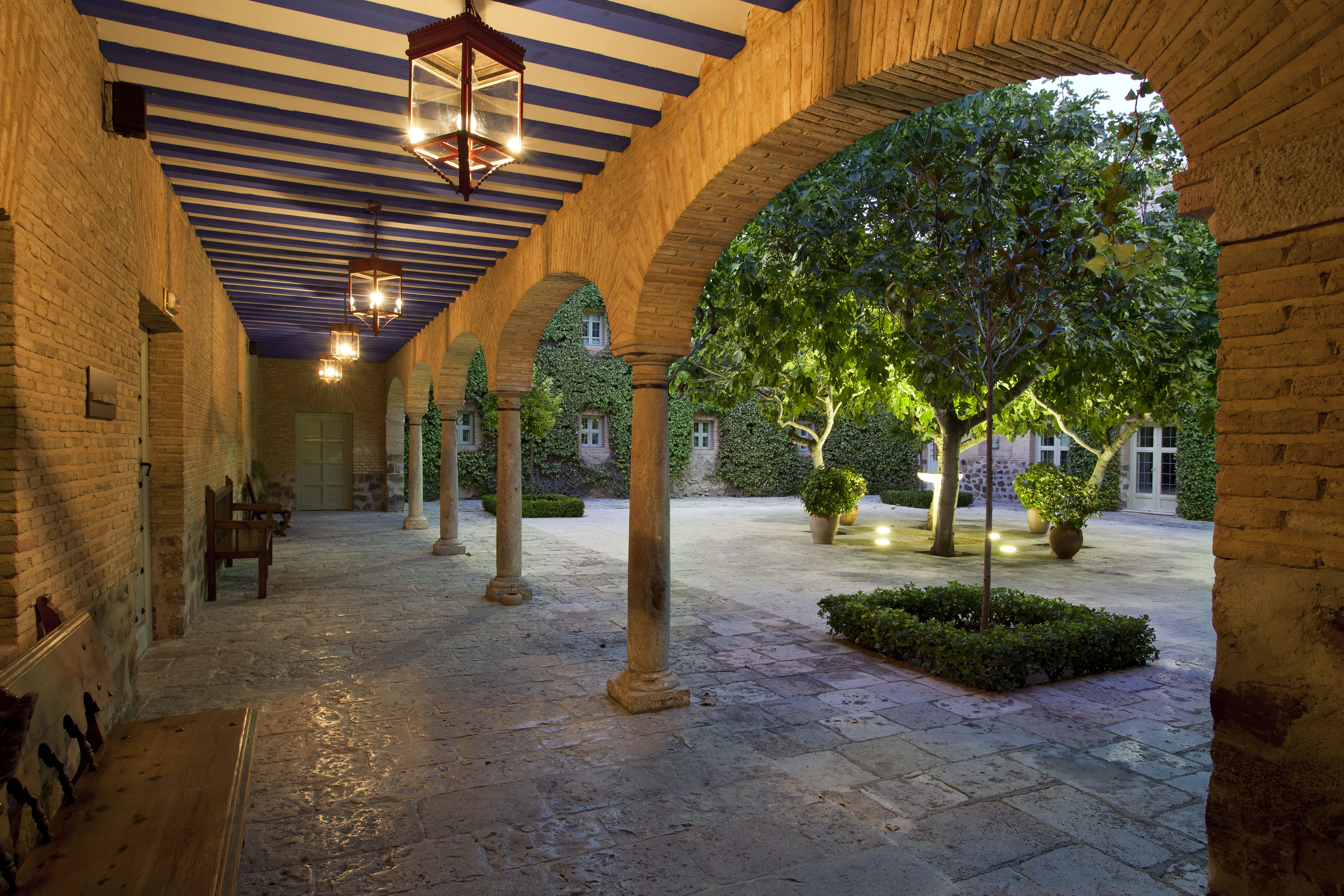 Parador de Almagro terrace and courtyard garden, traditional architecture, trees