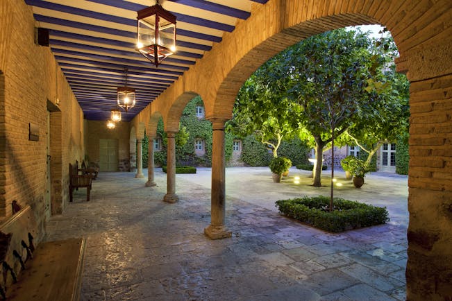 Parador de Almagro terrace and courtyard garden, traditional architecture, trees