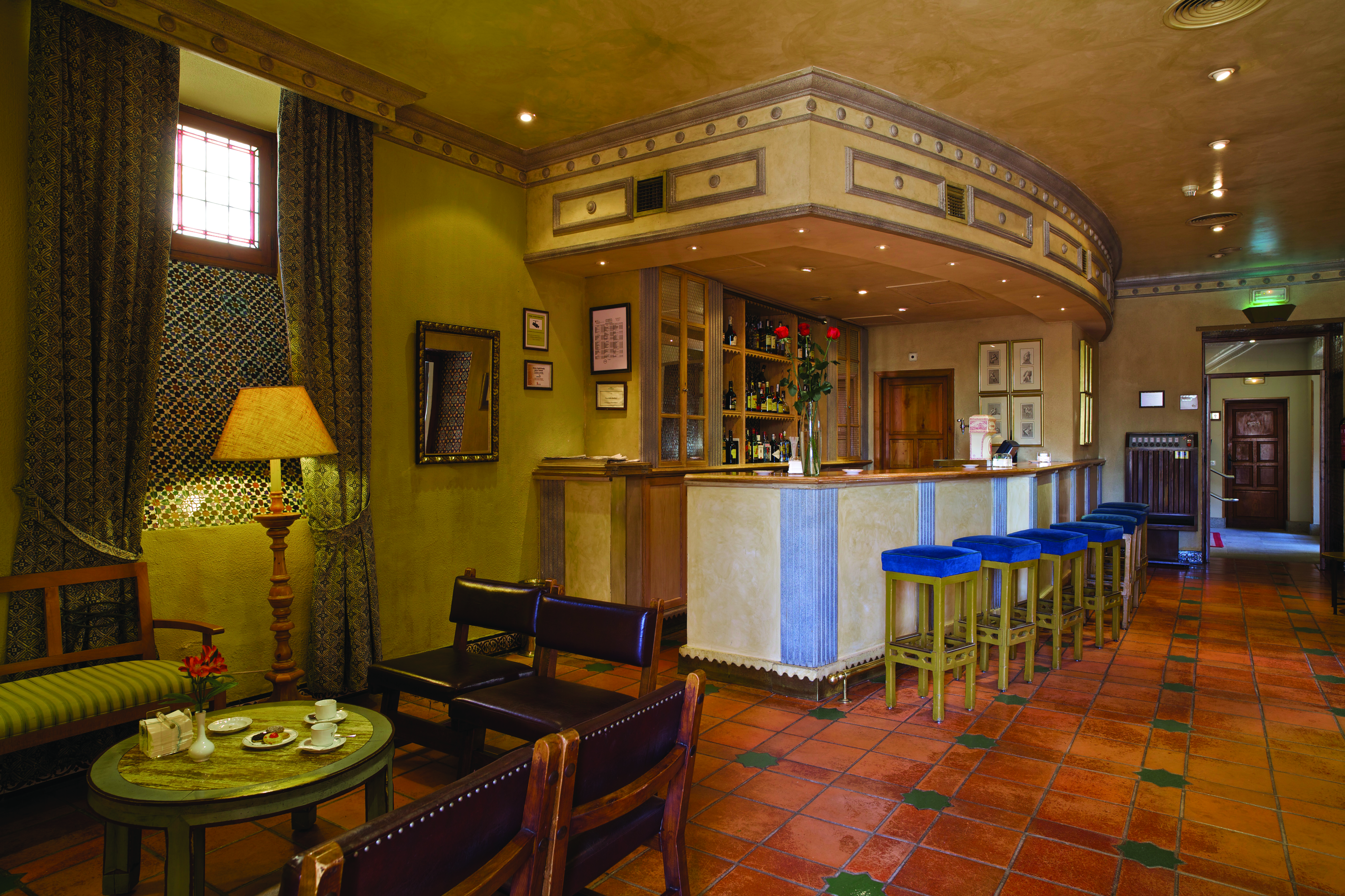 Parador de Avila Heart of Spain bar indoor seating area bar traditional décor tiles 