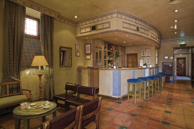 Parador de Avila Heart of Spain bar indoor seating area bar traditional décor tiles 