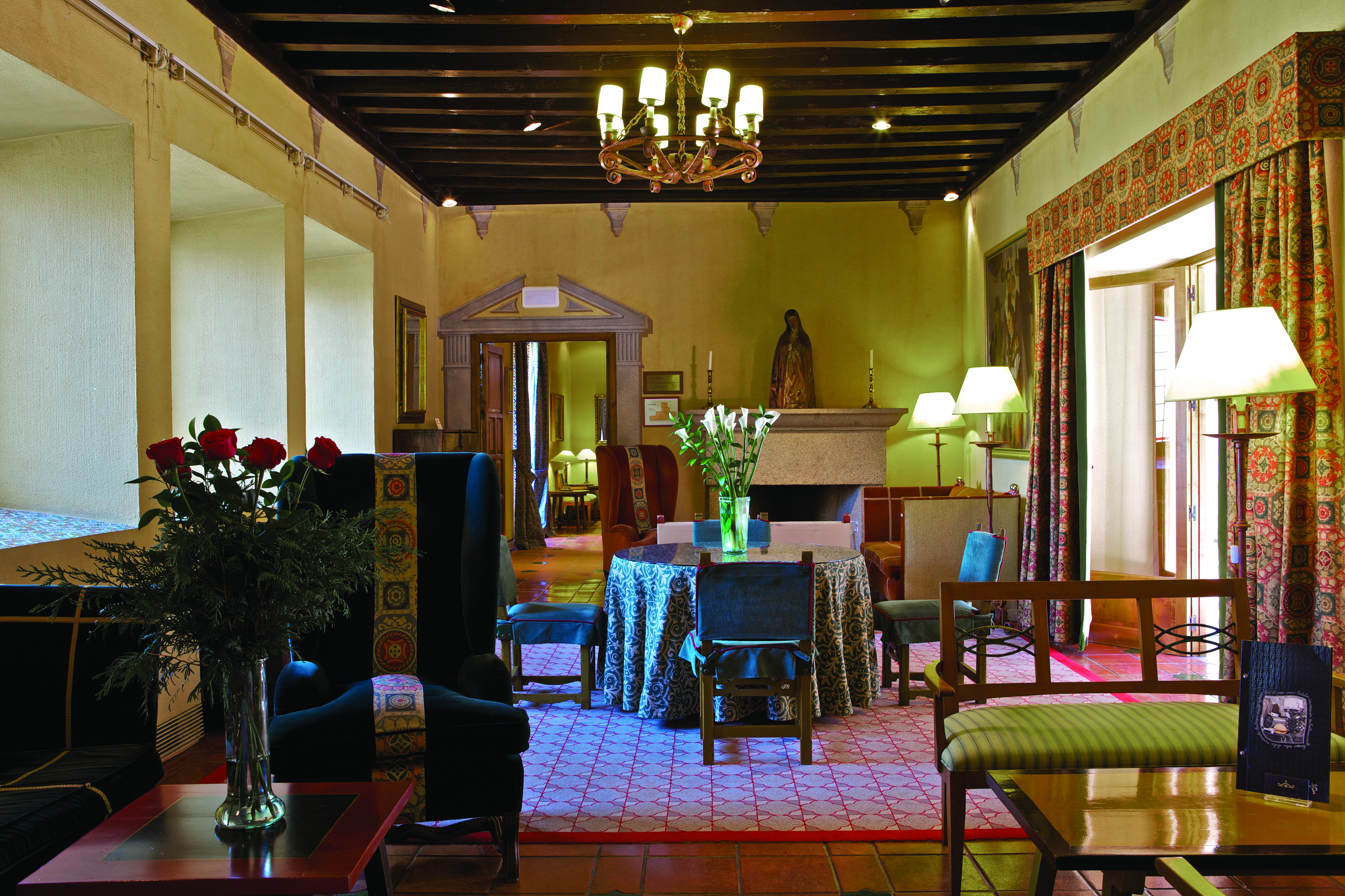 Parador de Avila Heart of Spain lounge indoor seating armchairs tables traditional décor