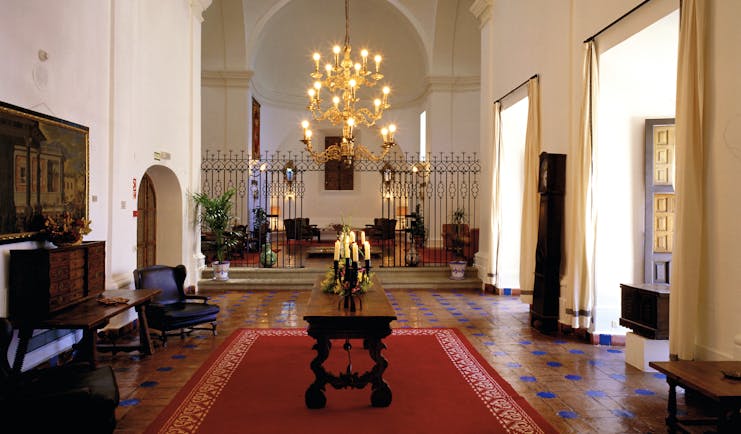 Parador de Merida Heart of Spain lobby chandelier tiled floors traditional décor