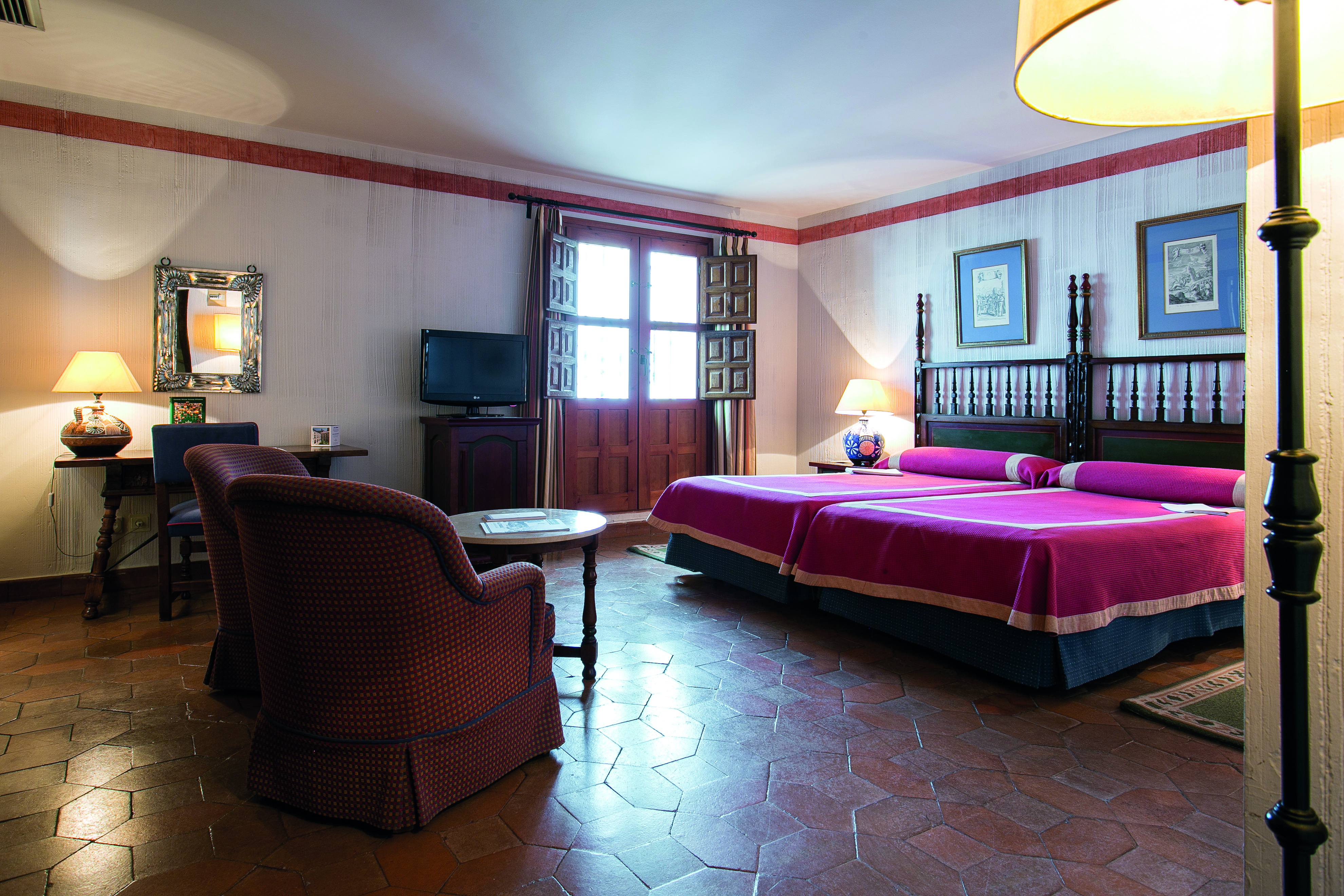Parador de Merida Heart of Spain standard double bed room bed seating area traditional décor