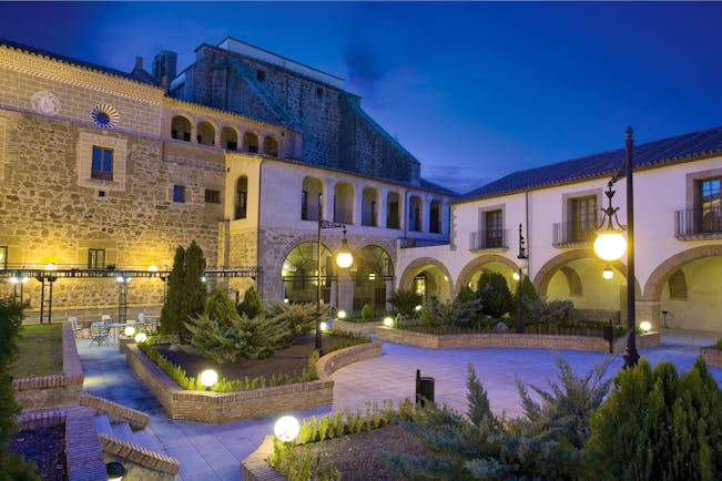 Exterior at night the lamps lighting the hotel up