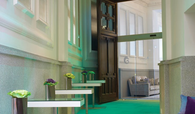 Hospes Madrid entrance stone walls large door