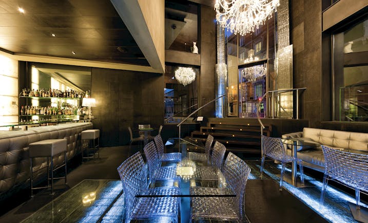 Hotel Urban Madrid glass bar glass tables and chairs chandelier bar stylish décor