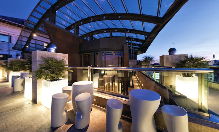 Hotel Urban Madrid rooftop abstract sculpture plants walkway