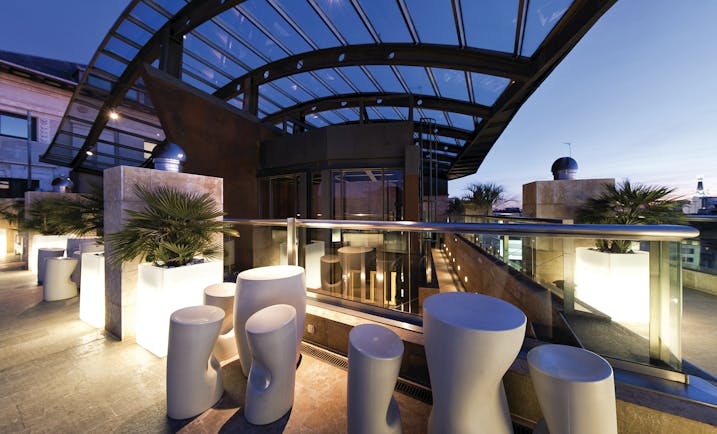 Hotel Urban Madrid rooftop abstract sculpture plants walkway