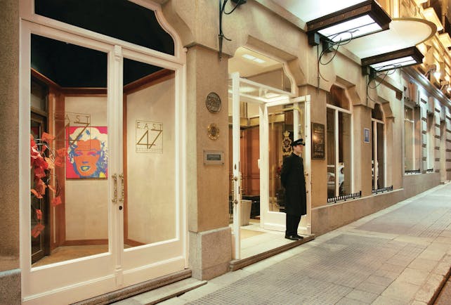 Villa Real Madrid entrance from street doorman pavement