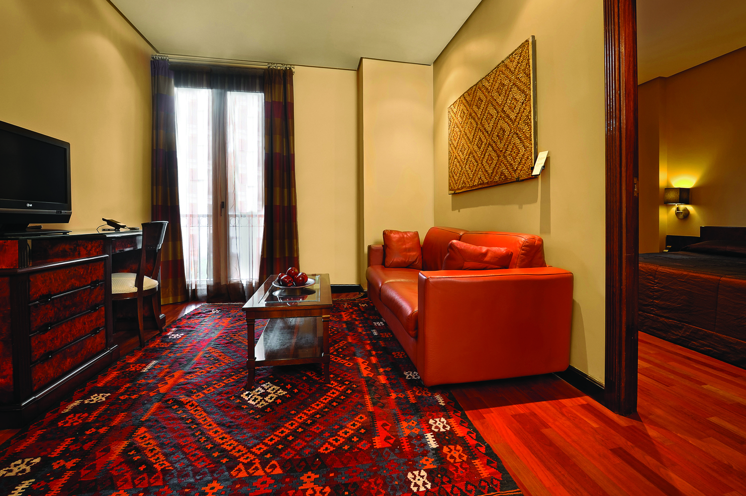 Villa Real Madrid junior suite lounge sofa desk television balcony modern décor