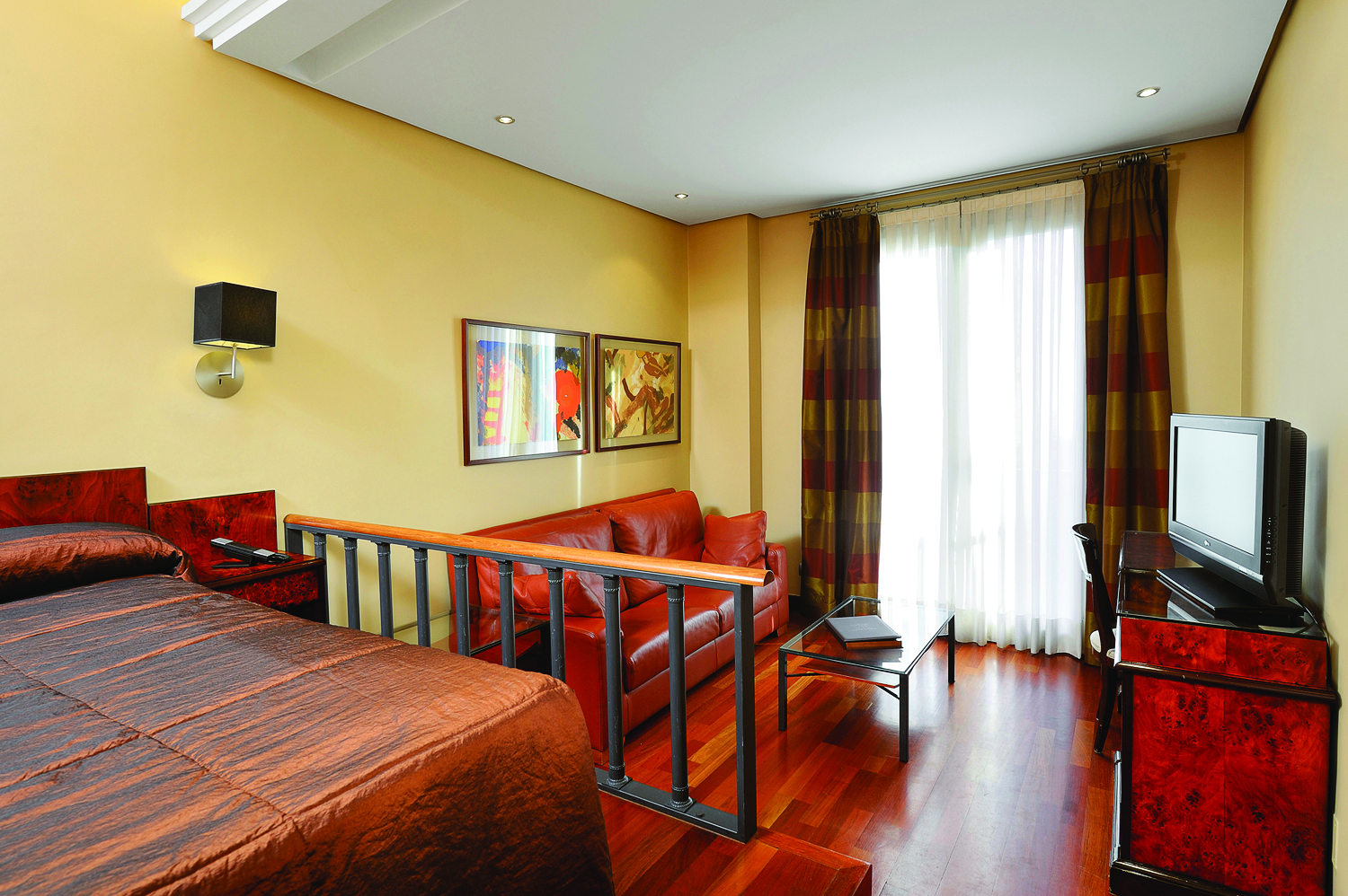 Villa Real Madrid superior room bed sofa television modern décor